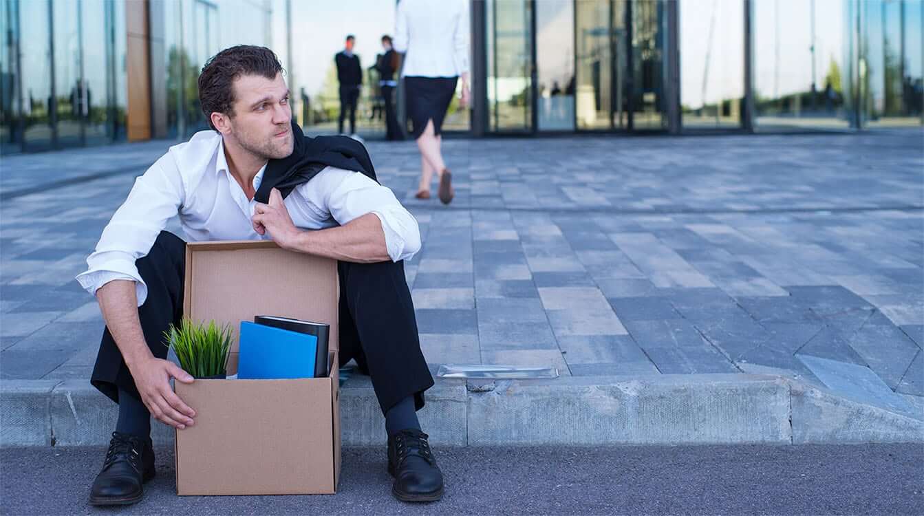 Fired Business Man Sitting Frustrated And Upset On The Street Ne